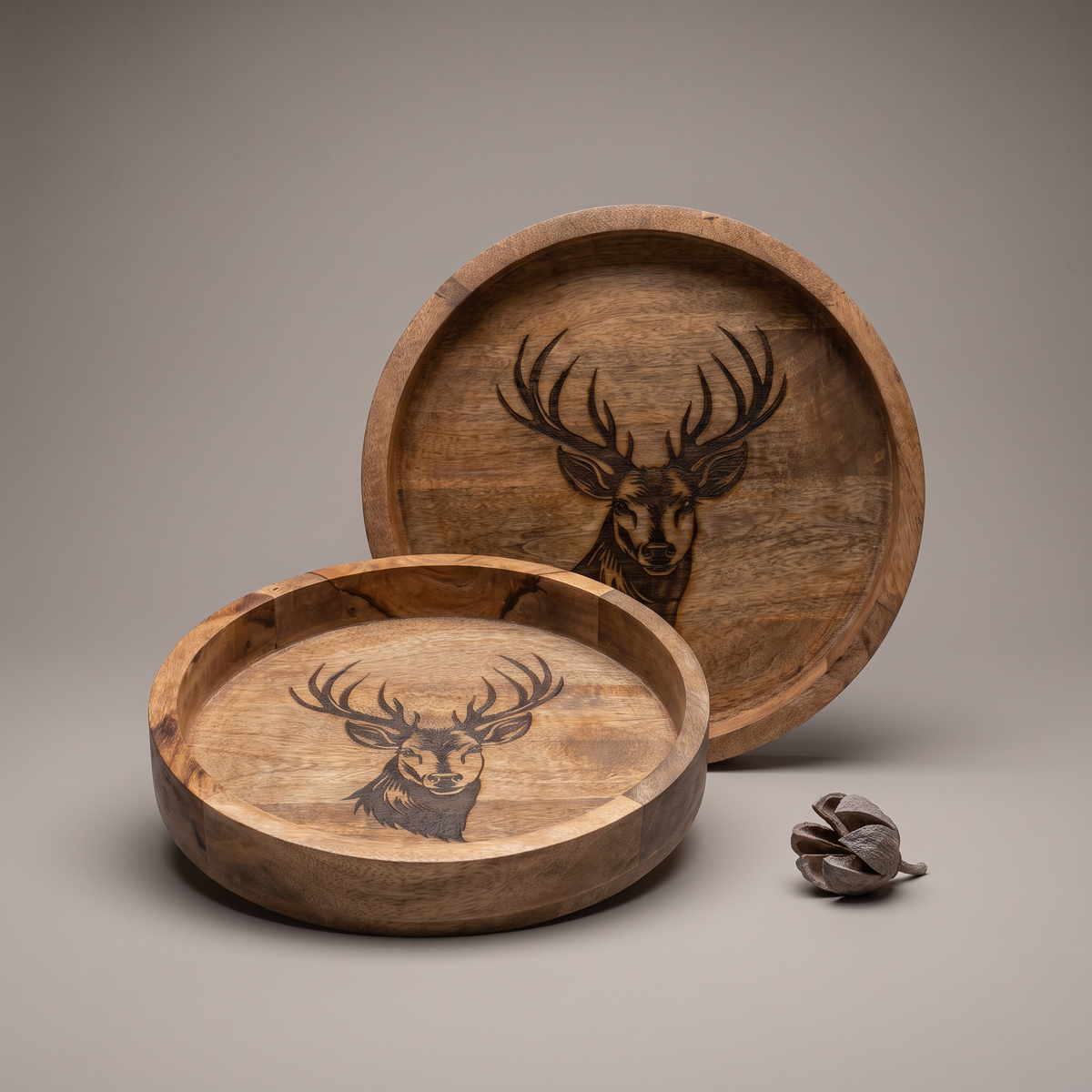 Black Reindeer circular trays (set of 2)