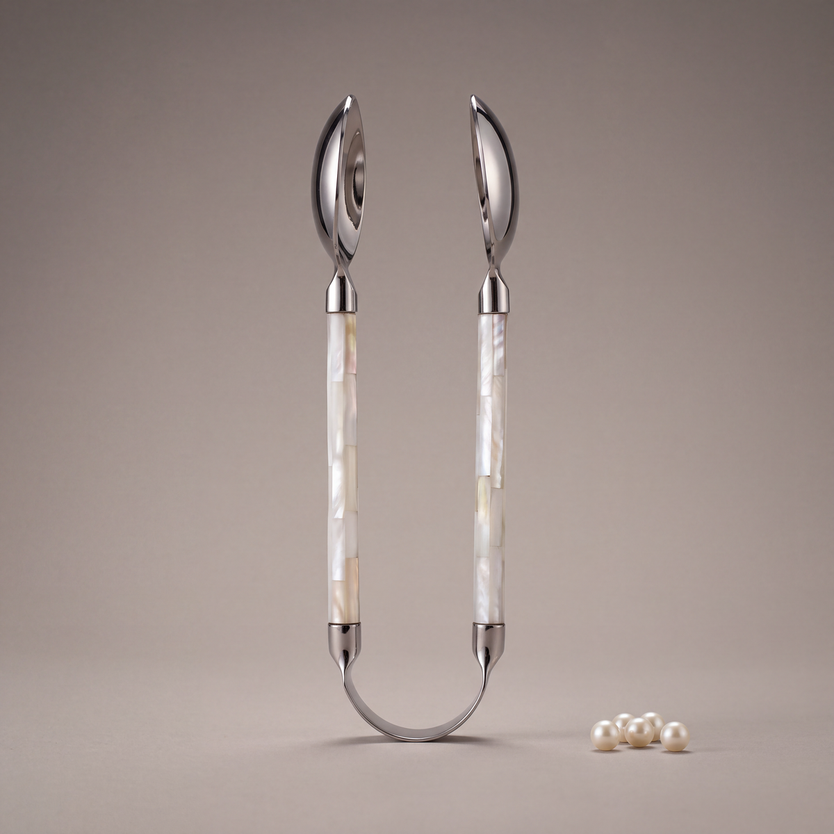White mother-of-pearl pastry tong