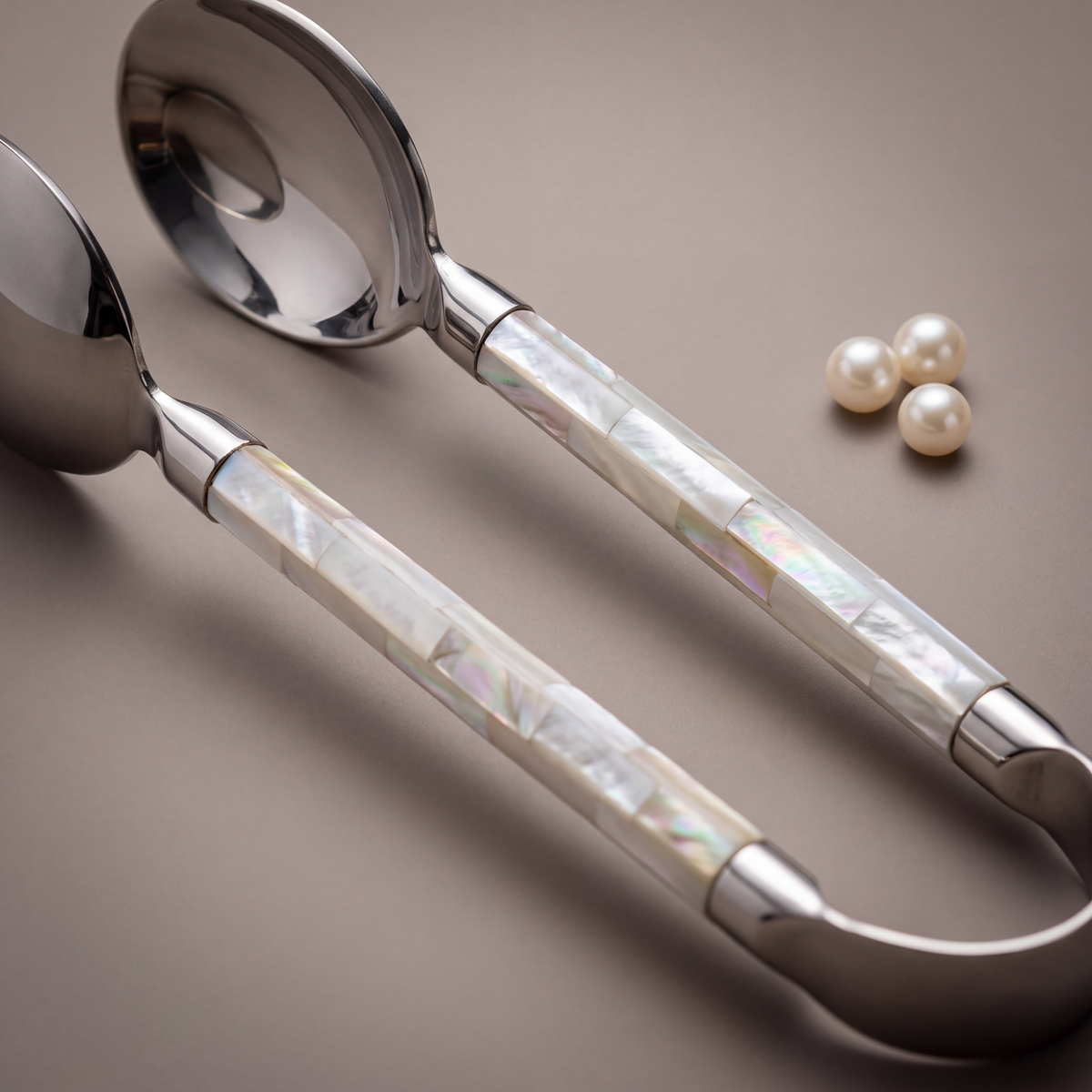 White mother-of-pearl pastry tong