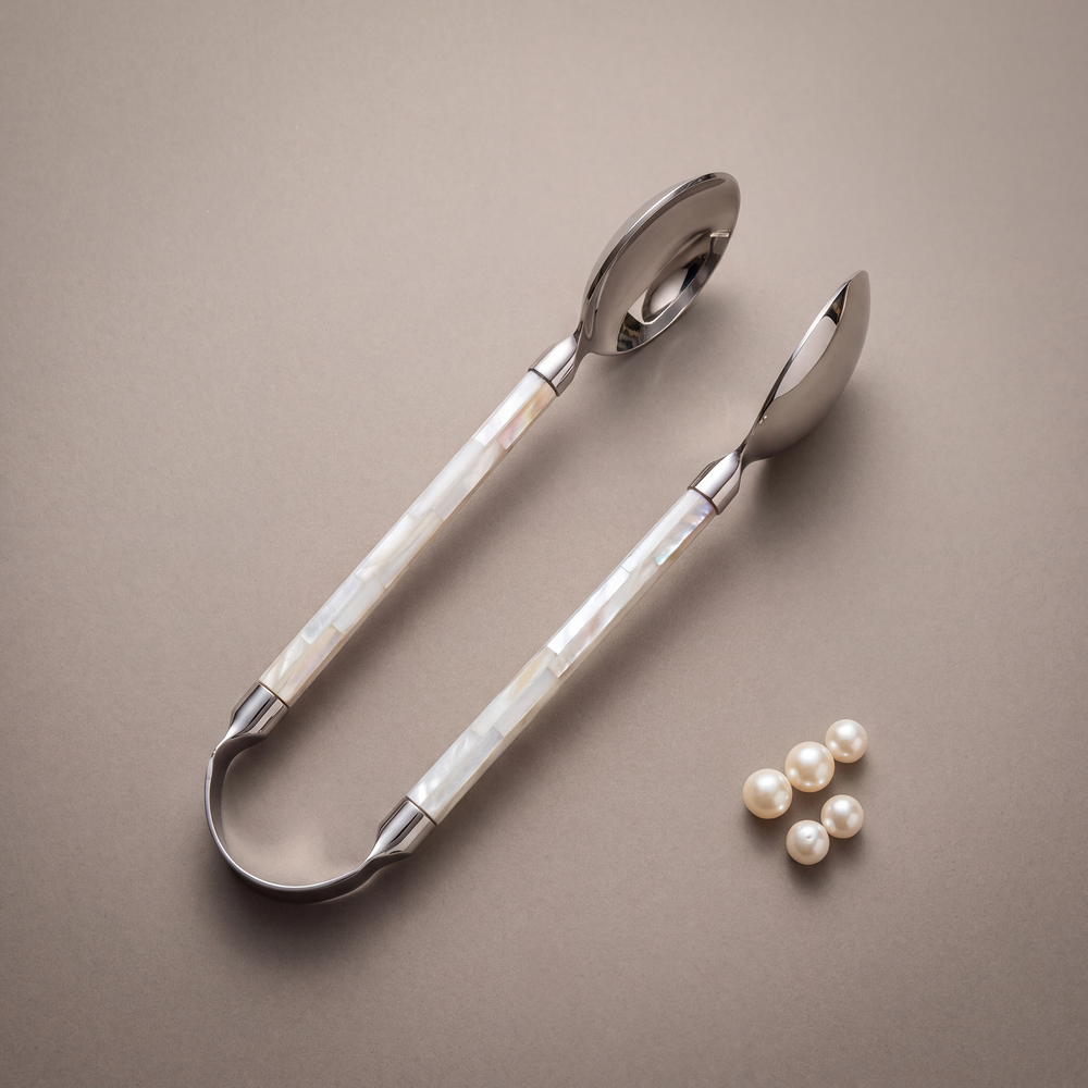 White mother-of-pearl pastry tong